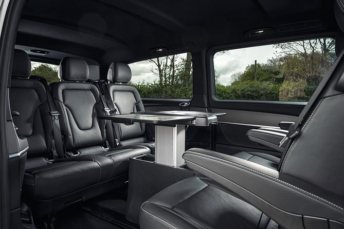 Arrival Transfer: Madrid Airport MAD to Madrid in Luxury Van - Meet and greet, luggage, and airport waiting time