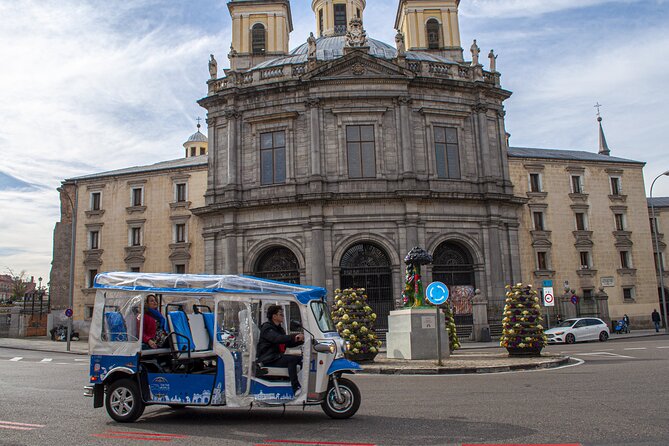 Eco Friendly Tuk Tuk Experience with the Local in Madrid - The Guinness Record Restaurant Connection