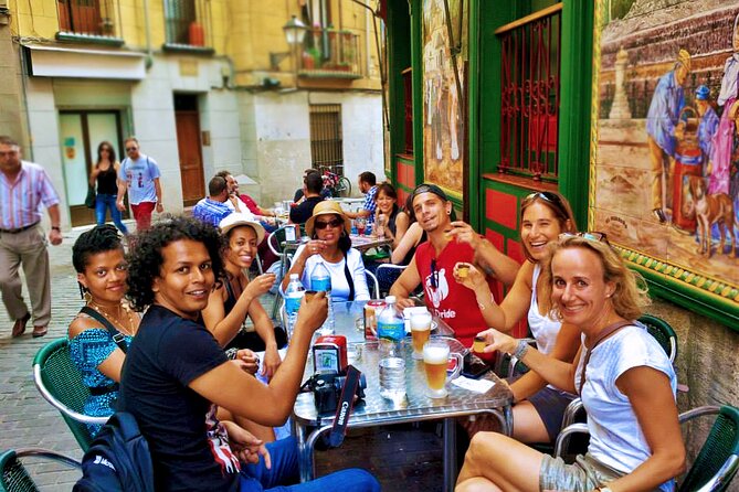 Flavours & Flamenco in Madrid Experience + Pub Crawl - Churros, chocolate, and Madroño at Puerta del Sol