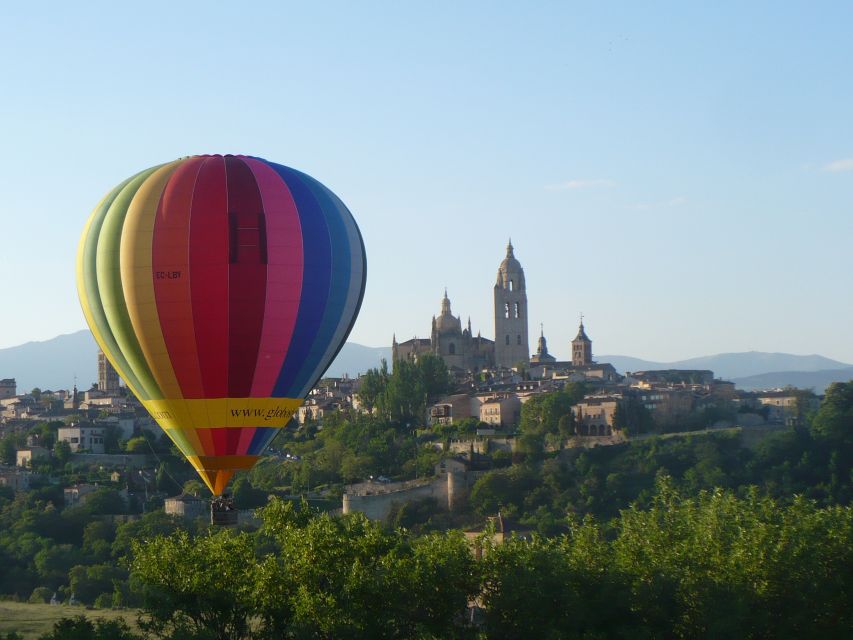 From Madrid: Hot Air Balloon Ride in Segovia with Pickup - Landing, champagne, and a simple breakfast
