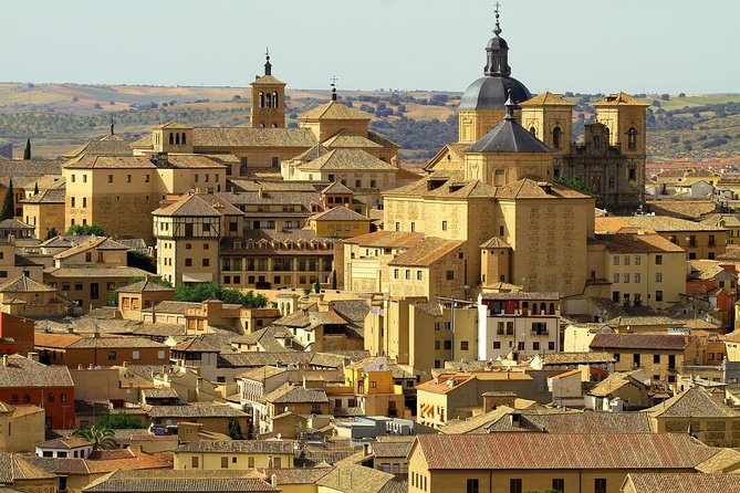 From Madrid: Segovia & Toledo with Alcazar and Cathedral - Coach travel, guides, and group size