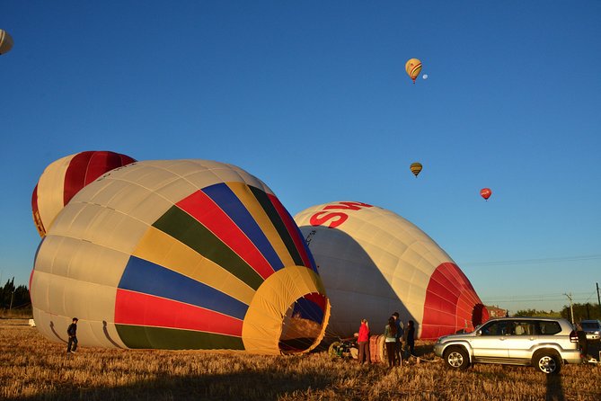 Hot Air Balloon Flight Over Segovia or Toledo - Landing, photos, and the Cava toast