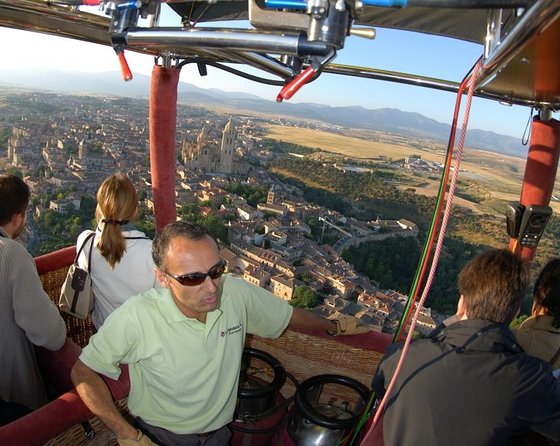 Hot-Air Balloon Ride over Segovia with Optional Transport from Madrid - The landing, picnic, and cava toast