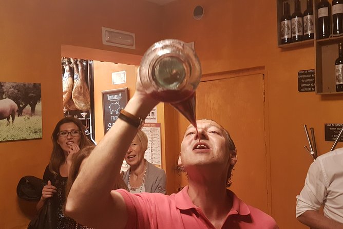 Iberian Ham and Wine Small Group Tour in Madrid - Stop two: comparing Jamón Serrano and Jamón Ibérico
