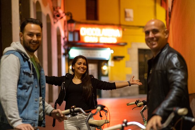 Madrid at Night: Vintage Bike Tour of City Highlights - Gran Vía and Puerta del Sol: Madrid’s public face
