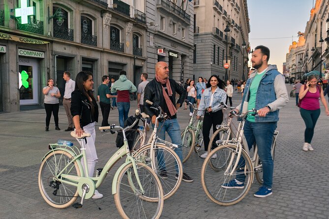 Madrid at Night: Vintage Bike Tour of City Highlights - Plaza de España and Plaza de la Villa