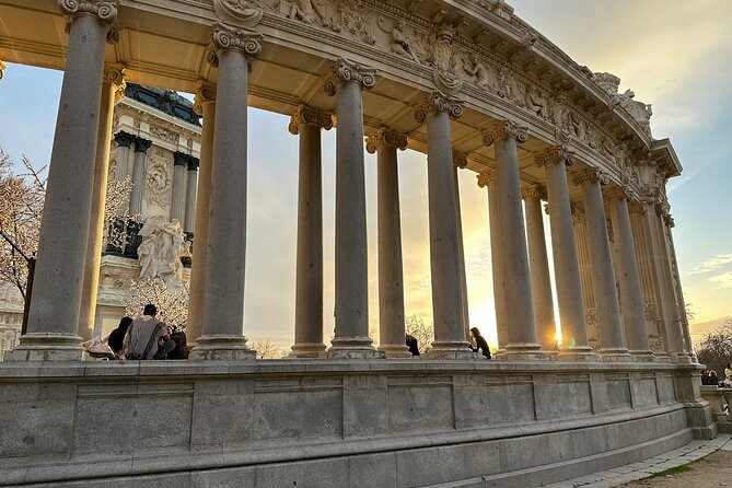 Madrid Bike Tour with Churros and Wine, Ham, and Cheese Upgrade - Crystal Palace and the Fallen Angel