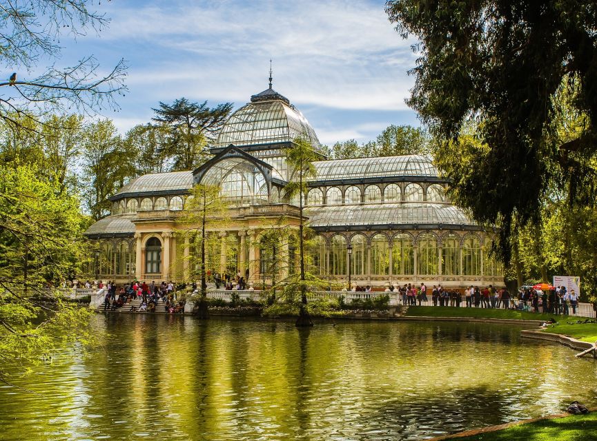 Madrid: Cibeles Rooftop & Retiro Park Guided Walking Tour - Seeing Retiro Park Through Its Major Sights