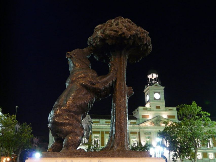 Madrid: Enchanted Evening Walking Tour in Spanish - Almudena Cathedral and the city’s sacred stories