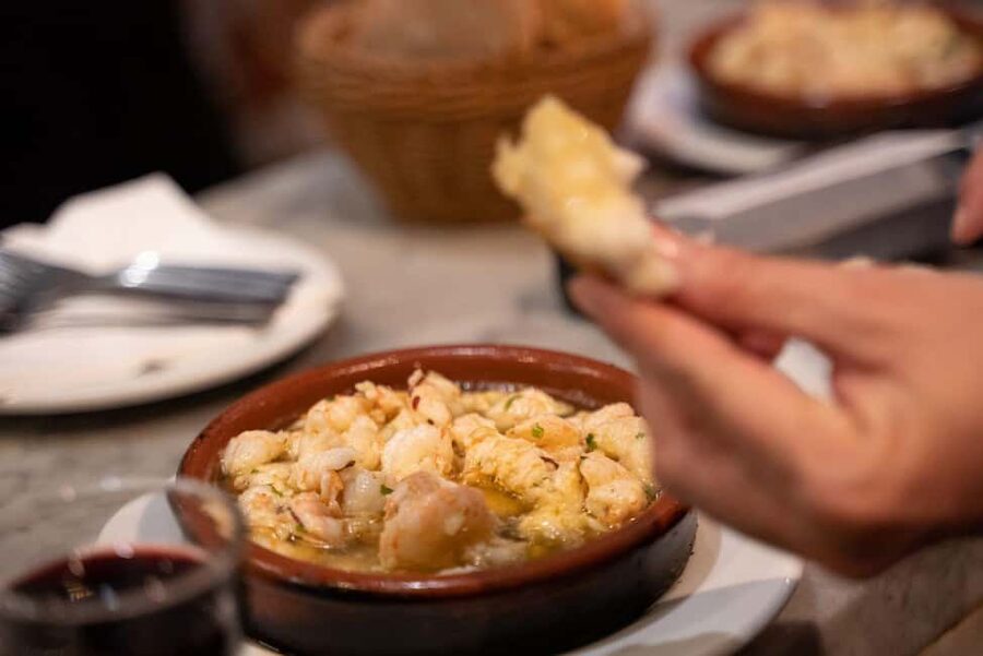 Madrid: Evening Tapas Tour with 5 Delicious Stops & Drinks - La Latina, Madroño liquor, and chorizo
