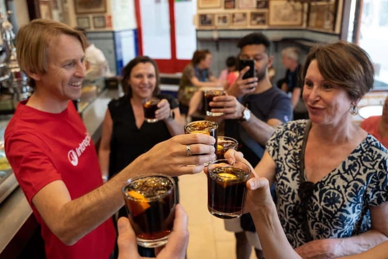 Madrid: Evening Tapas Tour with 5 Delicious Stops & Drinks - Shrimp, Spanish wine, and a final dessert