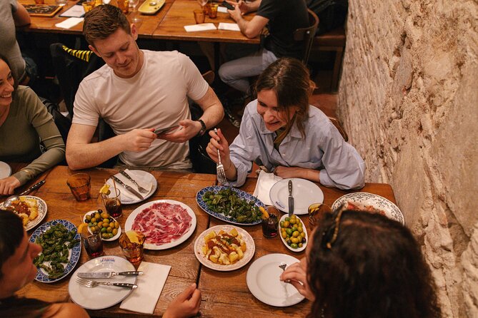 Madrid Food Walking Tour with Tapas and Vermouth - Cheese, cured meats, and the gilda