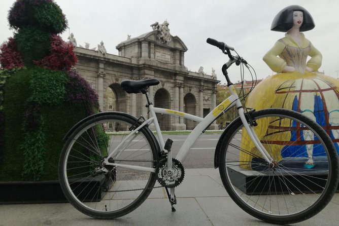 Madrid Fun and Sightseeing Bike Tour - The Royal Palace in a five-minute stop