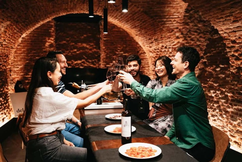 Madrid: Guided Tapas and Wine Tour with Terrace Visit - Iberian ham, sausage, and the taste of Spain