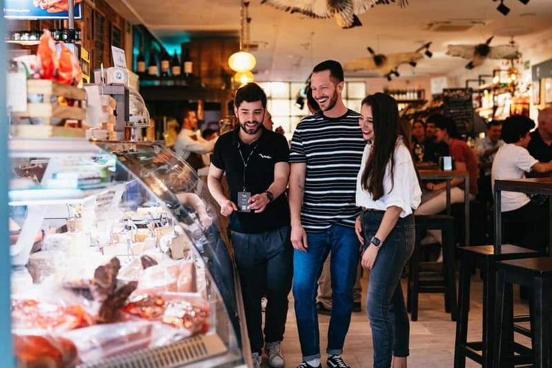 Madrid: Guided Tapas and Wine Tour with Terrace Visit - Huertas Street and the beef cheek stop
