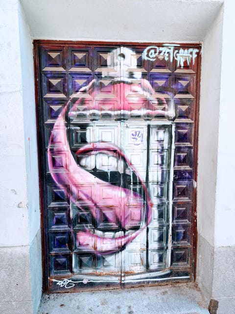 Madrid: Hidden Street Art Tour - Passing the Reina Sofía: street art beside major art