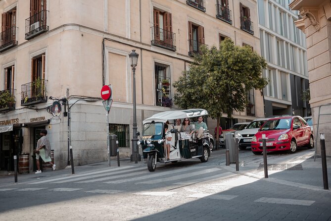 Madrid Historical Tour with Local Guide in Eco Tuk Tuk Private - Congress, Neptune, and Cibeles