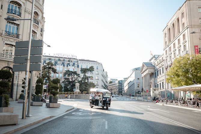 Madrid Historical Tour with Local Guide in Eco Tuk Tuk Private - From the market to Madrid’s local flavor