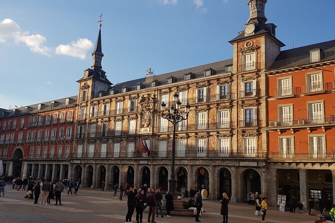 Madrid History Food Tour: Tapas & Drinks Tasting - Garlic shrimp, eggplant, and patatas bravas