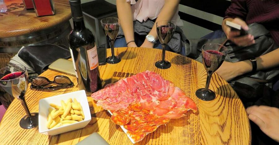 Madrid: Iberico Ham and Spanish Wine Small-Group Food Tour - Meeting at Plaza Isabel II near Ópera