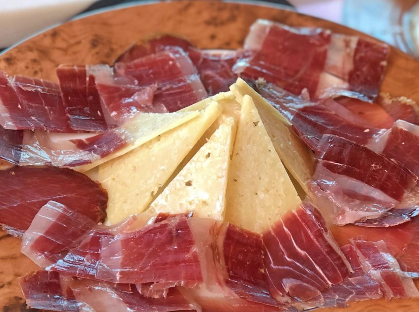 Madrid: Los Porches Flamenco Show with Tapas and Wine Ticket - Authentic atmosphere beyond the city center