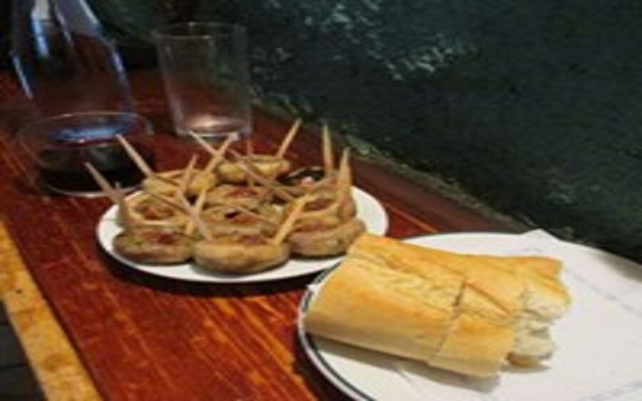 Madrid: Old Madrid Walking Food and Wine Tour - What happens at the three or four bars