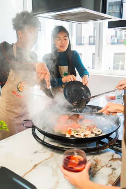 Madrid: Paella and Sangria Workshop with Tapas - Learning the practical side of paella