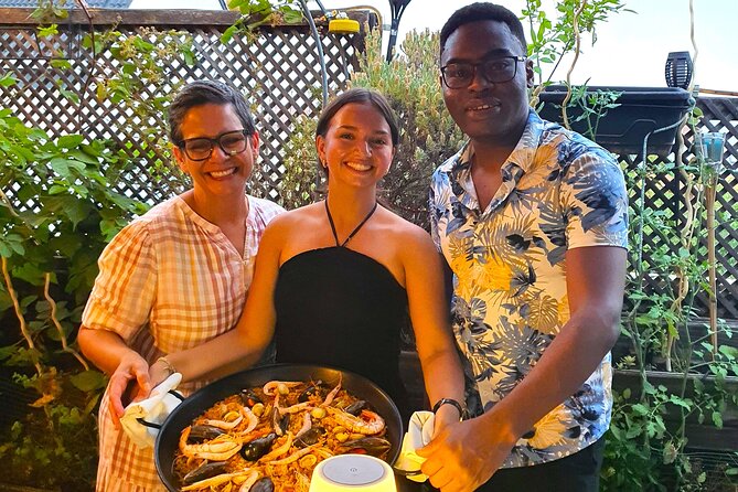 Madrid: Paella & Sangria Classes- Seafood, Chicken & Vegan option - Making the paella together