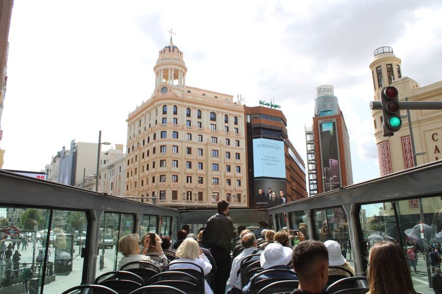 Madrid: Panoramic Open-Top Bus Day or Night Tour with Guide - Plaza Mayor, Atocha, and the return through the center