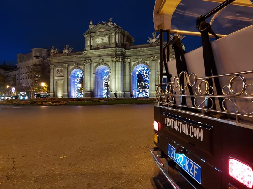Madrid: Private Christmas Lights Tour by Eco Tuk-Tuk - Puerta de Alcalá and the Retiro edge