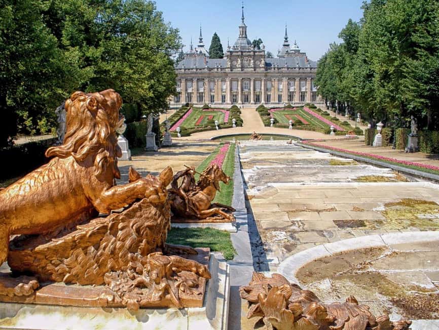 Madrid: Private Segovia Day Trip with Local Guide - Arriving beneath the Roman aqueduct