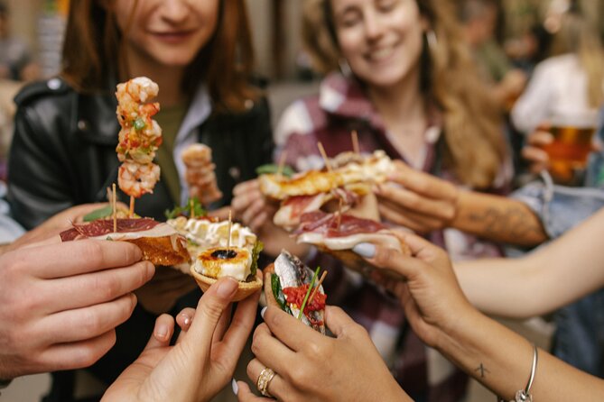 Madrid: Private Tapas & Wine Food Walking Tour in La Latina - Plaza de la Cebada starts with tortilla and beer