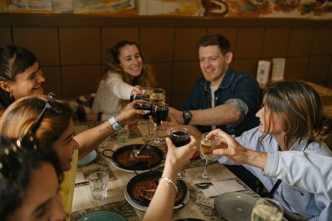 Madrid: Private Tapas & Wine Food Walking Tour in La Latina - Calle de Toledo brings the squid sandwich