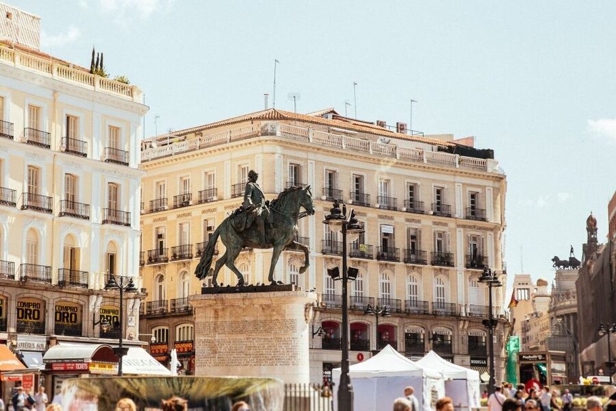 Madrid: Private Tour w/ Locals – Highlights and Hidden Gems - Plaza Mayor, where Madrid turns theatrical