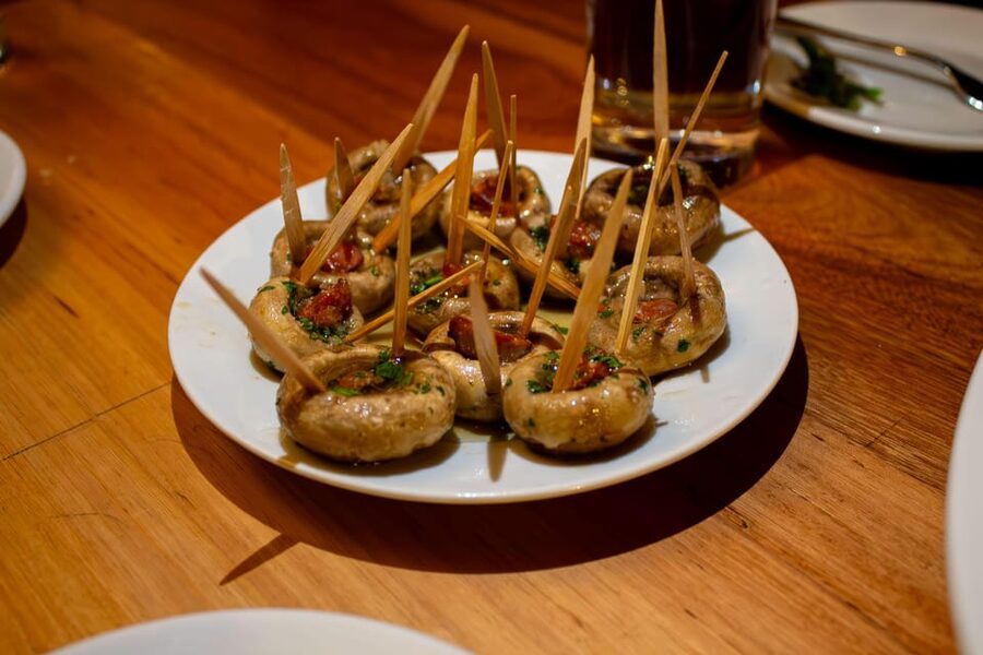 Madrid's Iconic Tapas, Taverns & History Experience - A local bar and the Spanish habit of standing