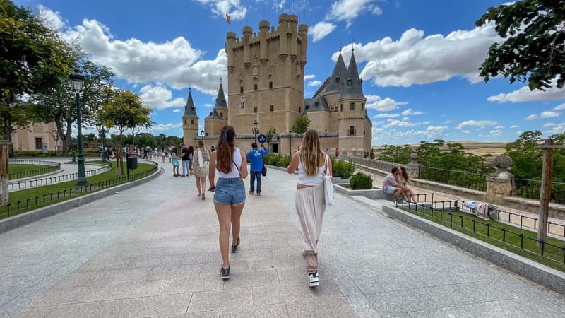 Madrid: Segovia & Ávila Full Day with Alcázar & Wall Tickets - Segovia’s Roman Aqueduct and compact old town