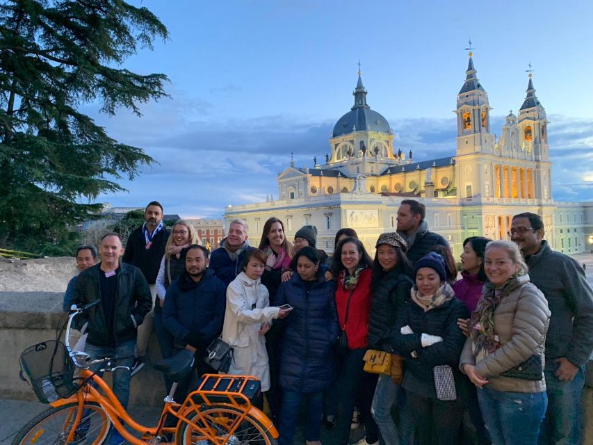 Madrid: Sunset and Night Lights Bike Tour - Starting on Calle Santiago