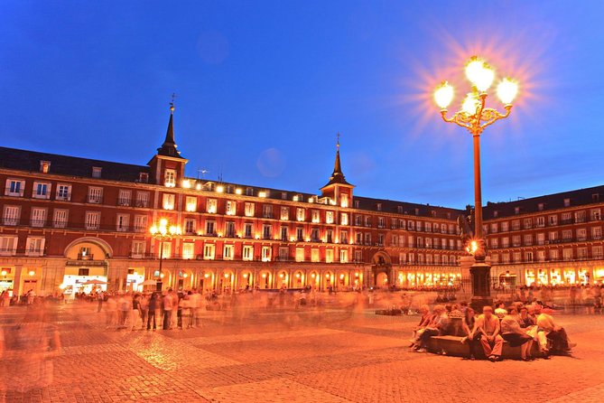 Madrid Sunset Walking Tour with Optional Flamenco Show and Dinner - Gran Via, Madrid’s lit-up main street