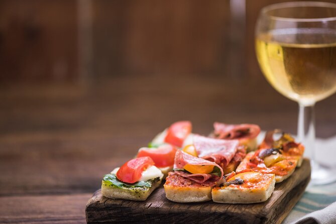 Madrid Tapas and Mysteries Walking Tour with Private Option - From tapas to a four-bar pub crawl
