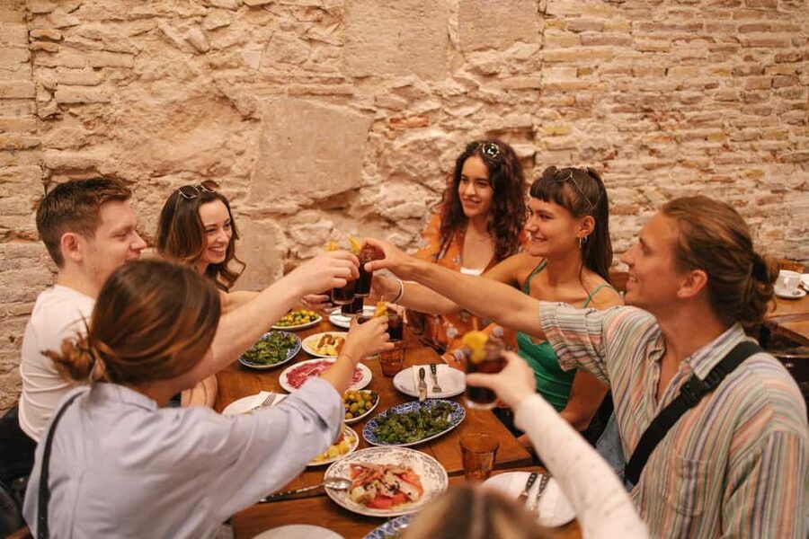 Madrid: Tapas Dinner Party Food Tour with Guide - Four tapas stops in Madrid’s La Latina