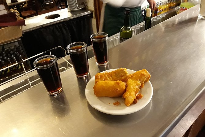 Madrid Tapas & Drinks: A Small Group Culinary Adventure - Eating through the Austrias neighborhood