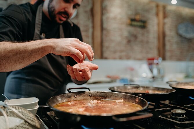 Madrid Tapas & Paella Cooking Experience with Local Market Visit - Begin at Mercado de Antón Martín