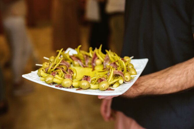 Madrid Tapas & Paella Cooking Experience with Local Market Visit - The meal is part of the value