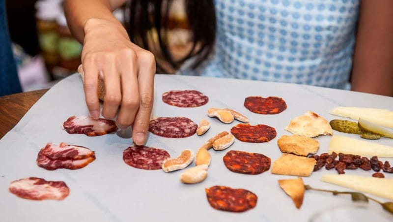 Madrid: Tapas Tour & Authentic Flamenco Experience - Maty and the work behind a flamenco costume