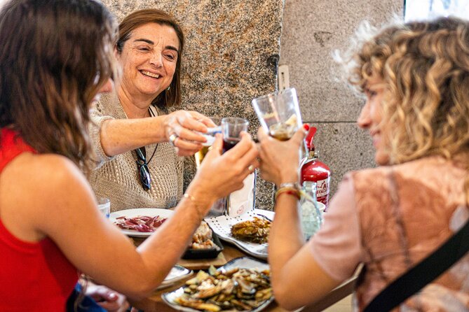 Madrid Tapas Tour with Food and Drink - Plaza Mayor connects food and city history