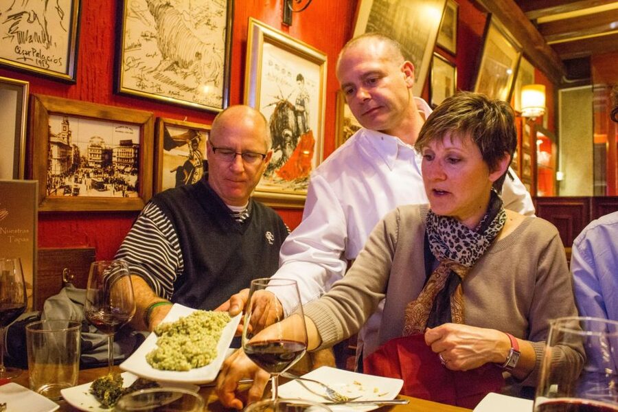 Madrid: Tapas & Wine Tasting Tour with Local Guide - Stop two brings regional wine and local specialties