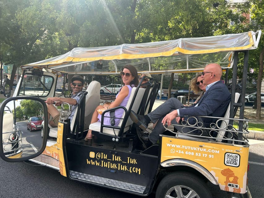 Madrid: Traditional Tour wh Private guide in yellow Tuk Tuk - Parliament, Cibeles, and Neptune
