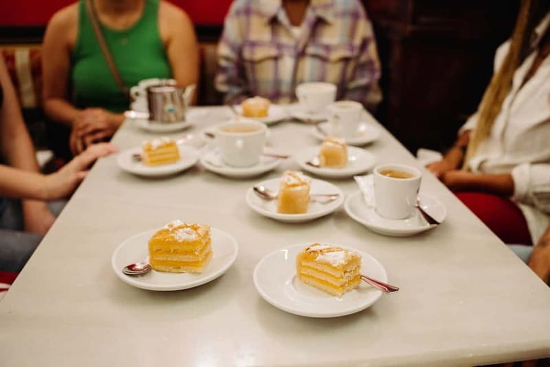 Madrid: Ultimate Food Tour of Local Markets & Tapas - Casa Revuelta and the calamari sandwich near Plaza Mayor