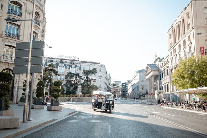 Madrid Welcome Tour with Local Guide in Eco Tuk Tuk Private - From the covered market to San Francisco el Grande