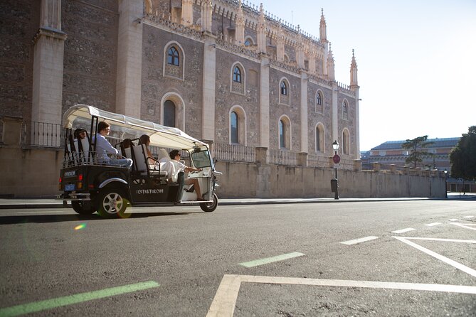 Madrid Welcome Tour with Local Guide in Eco Tuk Tuk Private - Almudena Cathedral and the Royal Palace